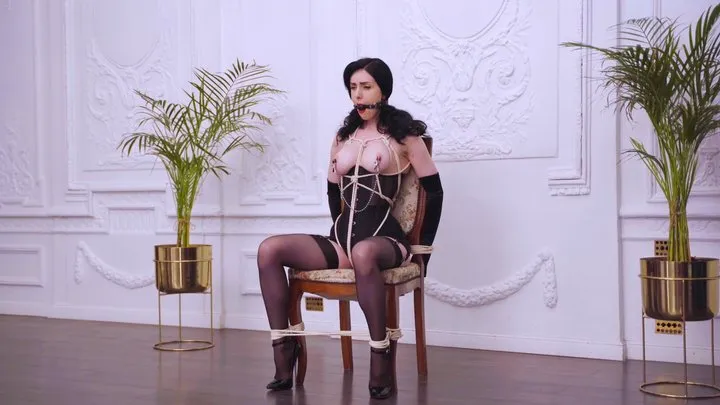 Fetish bondage on a chair