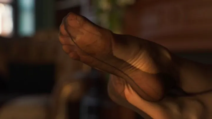 Ballet feet with calluses in nylon stockings