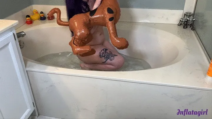 Riding Inflatable Scooby In The Bathtub