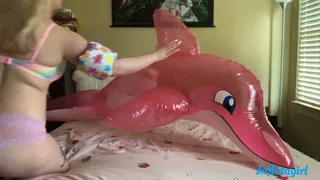 Riding My Pink Inflatable Dolphin