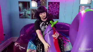 Vampire Girl Wrestles With Pet Inflatable Snake