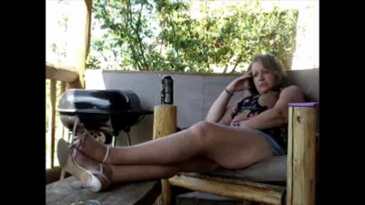 Deb Relaxing on the Back Patio at the Prescott Valley Resort Wearing Blue Denim Shorts & White Memorable Moments Sandals 2