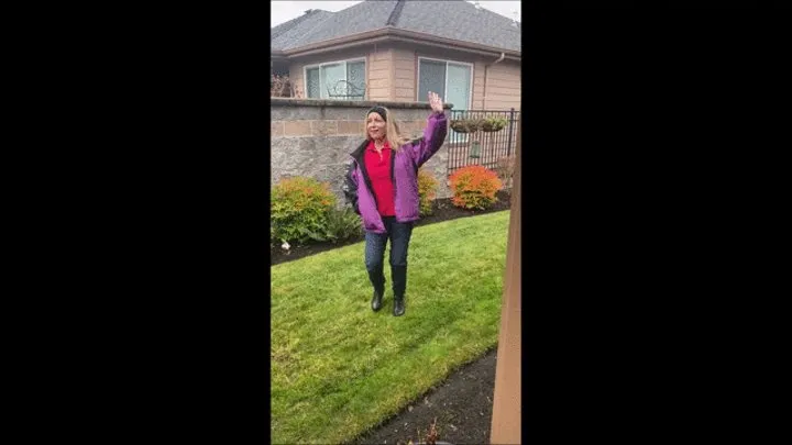 Deb teasing in the grass before shopping in her black Yum ankle boots & jeans