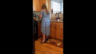Hot wife home from the office fixes dinner wearing her sexy dress with blue Comfort Plus spiked heel pumps