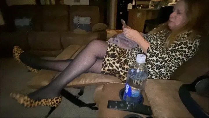 Deb Relaxing After Sex Wearing Her Fuckable Cheetah Print Skirt and Blouse with Black Stockings and Dangling Cheetah Print Rockport Spiked Heel Pumps (3-5-2021)