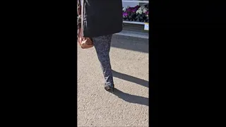Shopping in Her Black Patent Cole Haan Pumps with Damaged Black Spiked Heels