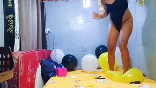 Sexy Juju Stomps To Pop Yellow Black And White Balloons
