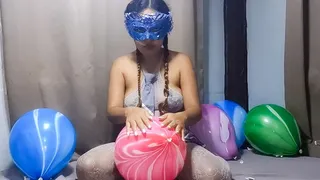 Sexy Masked Juju Sits To POP Your Marble Balloons