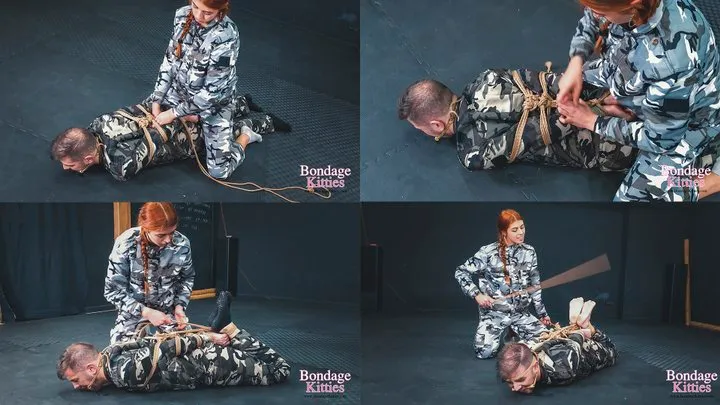 Military man hogtied and interrogated by military girl - SPANISH,