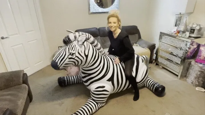 Supersized zebra inflatable humping fun smoking then cigarette pop