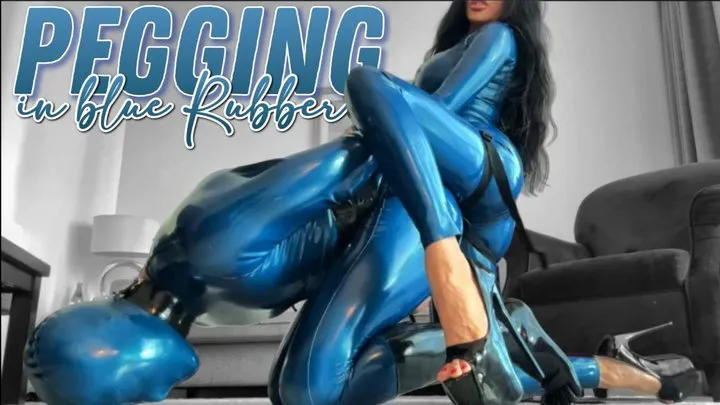 EvilWoman: Pegging in blue rubber