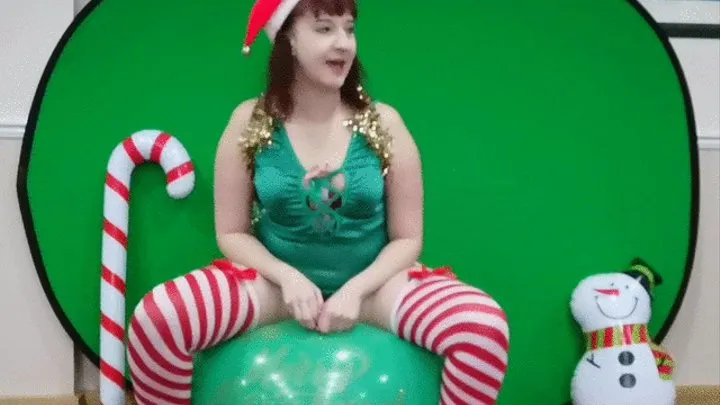 Naughty elf pops Santa's balloons