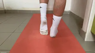 STRETCHING AFTER WORKOUT STINKY FEET IN SOCKS KIRA