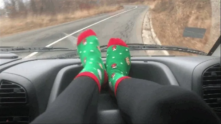 STINKY SOCKED FEET ON A CAR DASHBOARD