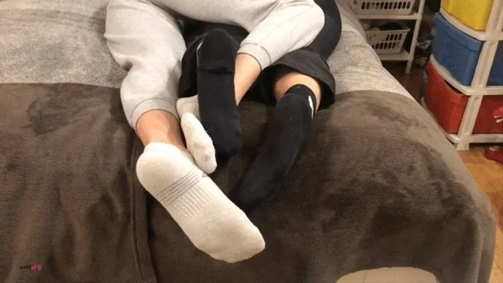 FOOTSIE WRESTLING IN SOCKS AND BAREFOOT