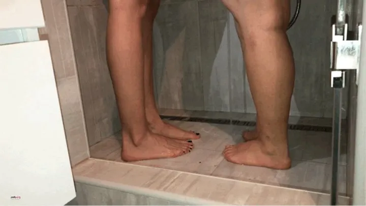 DIRTY FEET WASHING IN A SHOWER FOOT SCRUBBING