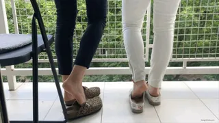 TWO GIRLS SHOEPLAY IN CLOGS ON A BALCONY