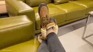 KIRA'S BOOTS IN FURNITURE STORE