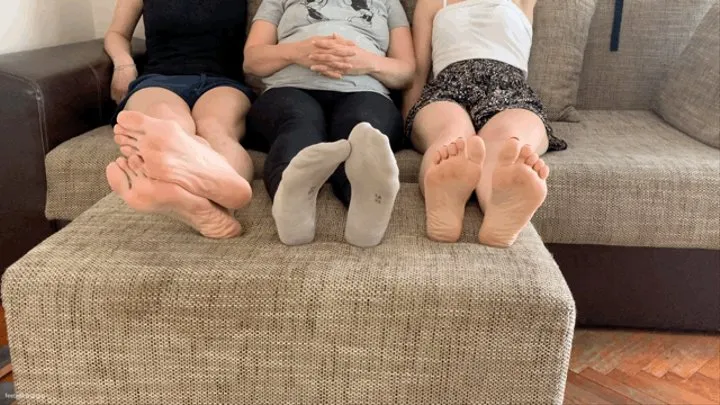 TWO GIRLS SECRETLY PLAYING FOOTSIE WHILE ROOMMATE IS AWAY