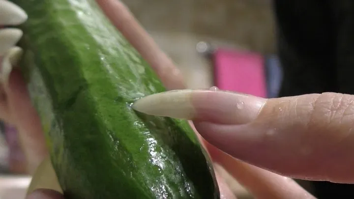 Claw and sliced cucumber with sharp nails