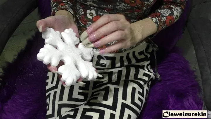 nails destroying the styrofoam snowflake