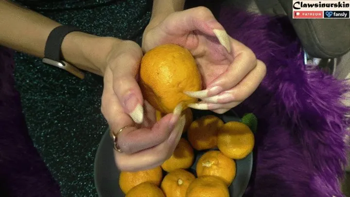 Nails In Action - clawing oranges