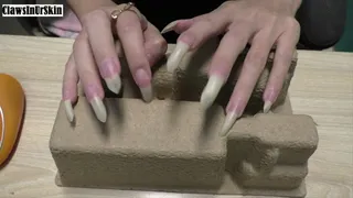 wild scratching of cardboard