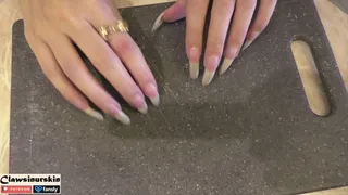 nails scratching the plastic board hard