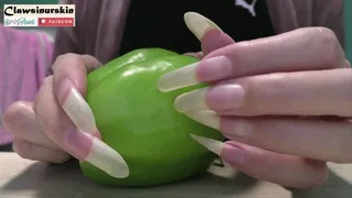 Nails cutting and destroying pepper