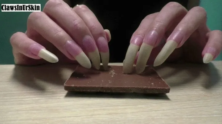 Nails scratching chocolate