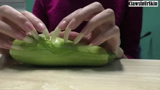aggressively scratching and destroying the zucchini with sharp nails
