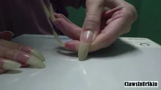 piercing the box with my nails