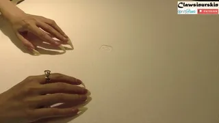 Nails In Action - scratching styrofoam