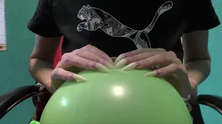 Popping balloons with long nails