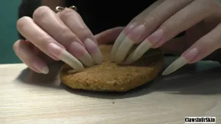 Nails crush old cookie into flour