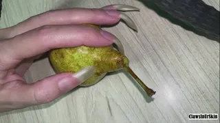 i crush this pear with claws on left hand