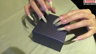 Long nails scratching and ruining the box