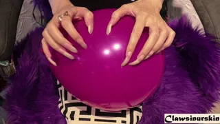 nails scratching balloons to burst