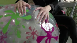 Lets puncture huge beach ball with nails