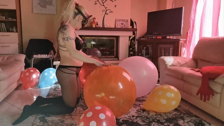 Sexy cat finds big ballons