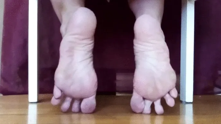 WRINKLED SOLES UNDER A CHAIR