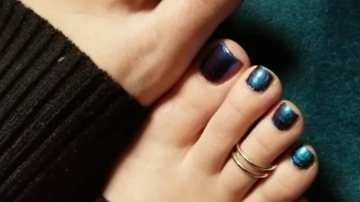 Closeup Toes With Color Changing Polish