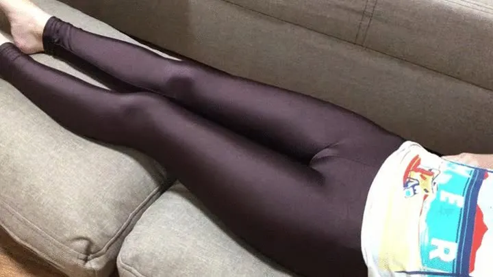 Evelina in brown spandex leggings