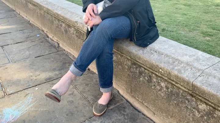 Candidly-Shot Dipping and Dangling Shoeplay on Walk in Cambridge