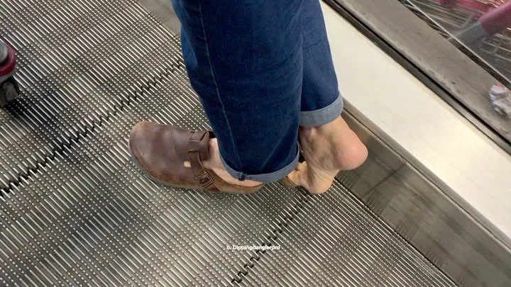 Candid Dipping Clogs Shoeplay in the Supermarket