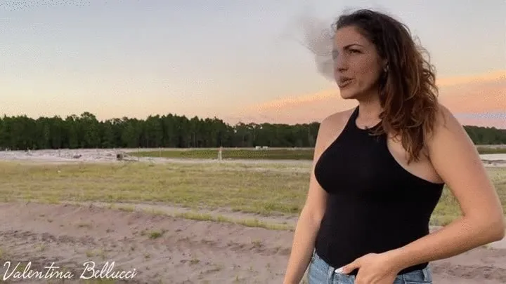 Smoking cigarette outdoors - sexy lips and mad look