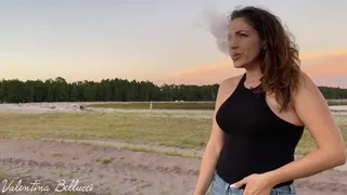 Smoking cigarette outdoors - sexy lips and mad look