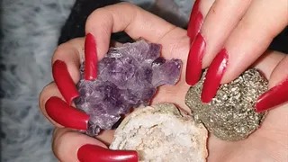 Minerals in long red nails