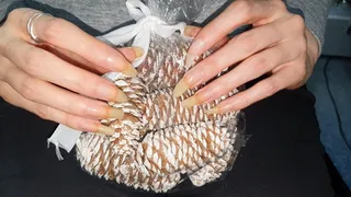 Scratching the cones with long natural nails