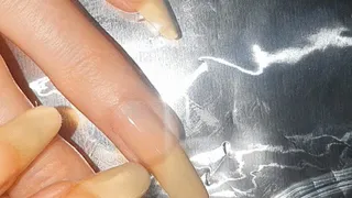 I tear the cauliflower and the foil with my nails